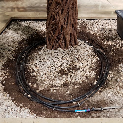 Foto von der Neuverlegung eines Wasserschlauchs